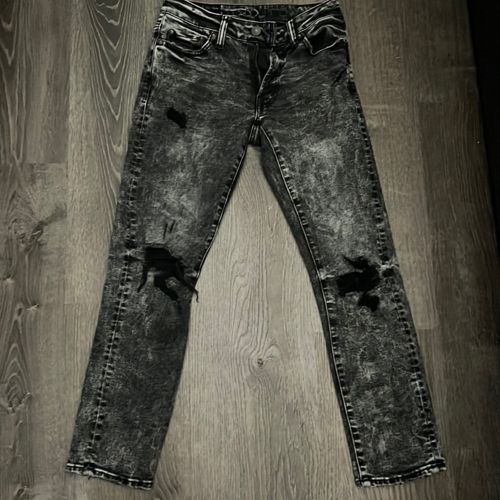 Ripped Grey/washed jeans from American Eagle 26 x 28